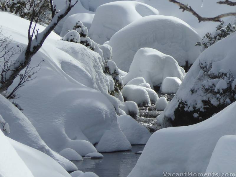 Little cascades between the snow white canyons