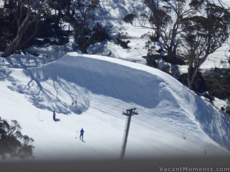 Re-entry wall (1/4 pipe?) beside Antons T-bar<BR>photographed through an open window from the centre of Eagles Nest Restaurant 