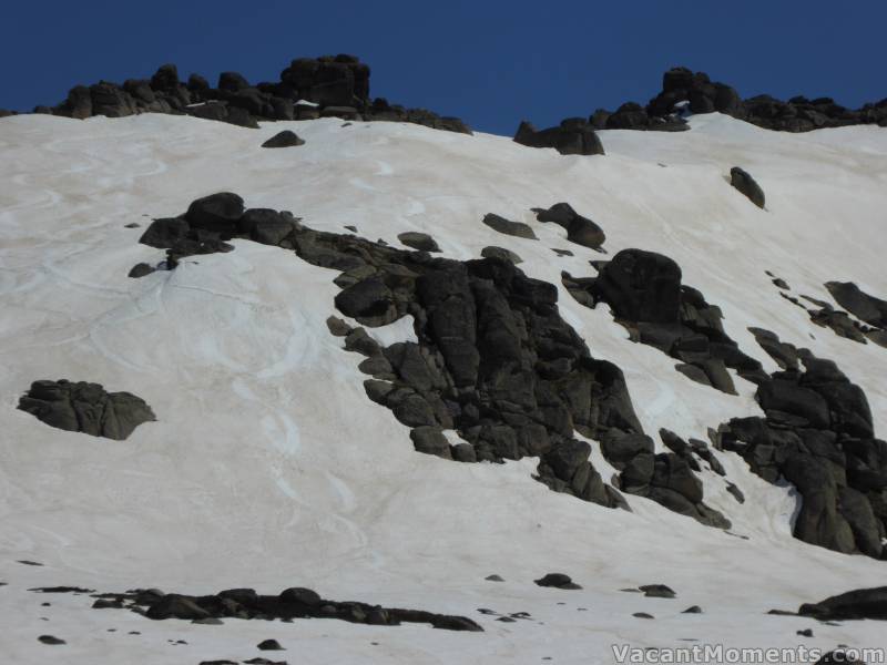 Just skiers left of the Main Face (and a bit of a mishmash of turns)<BR>The chute on the right had just enough snow to negotiate with jumping