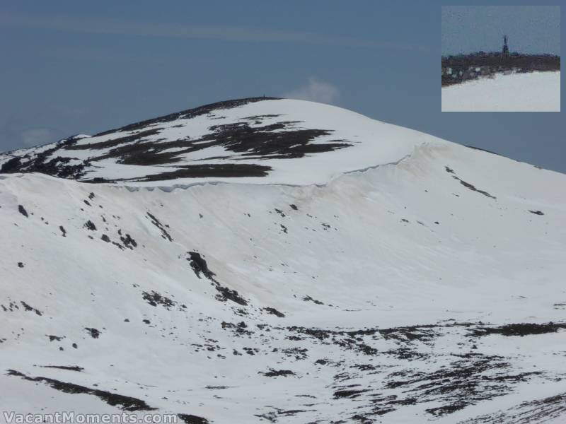 A view of the Kosi Cornice (what's left  of it)<BR>a close up of someone standing on the cairn - the highest point in Australia