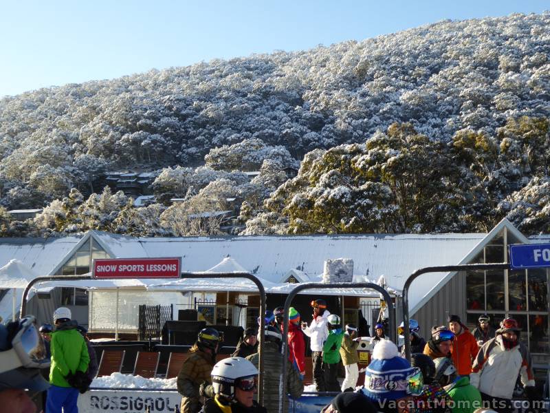 Waiting for first ride on Kosi Chair - note snow behind the village