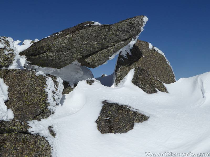 A peek at a peak - through a hole in the rocks