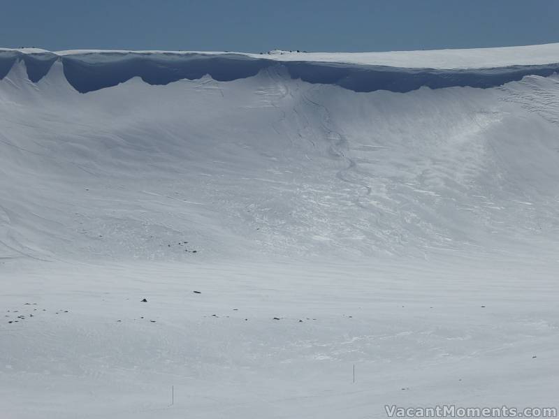 Skiing the gap in the cornice where the snow balls raced around me