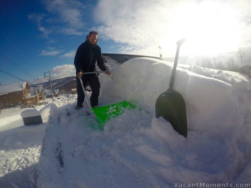 Peter clearing the roof. It looks like he has all the gear.