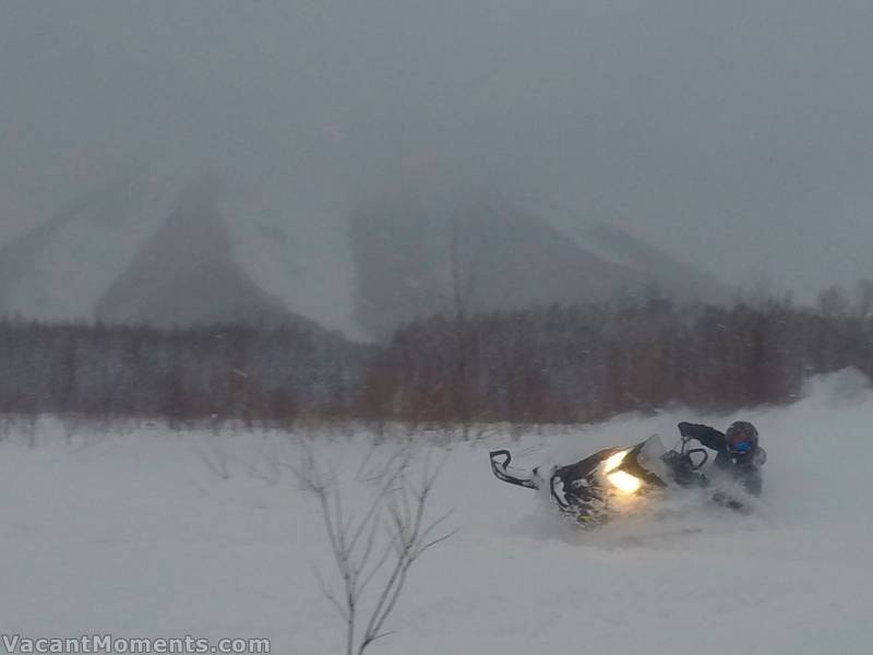 Meanwhile in Rusutsu, Peter takes his skidoo for a run after work