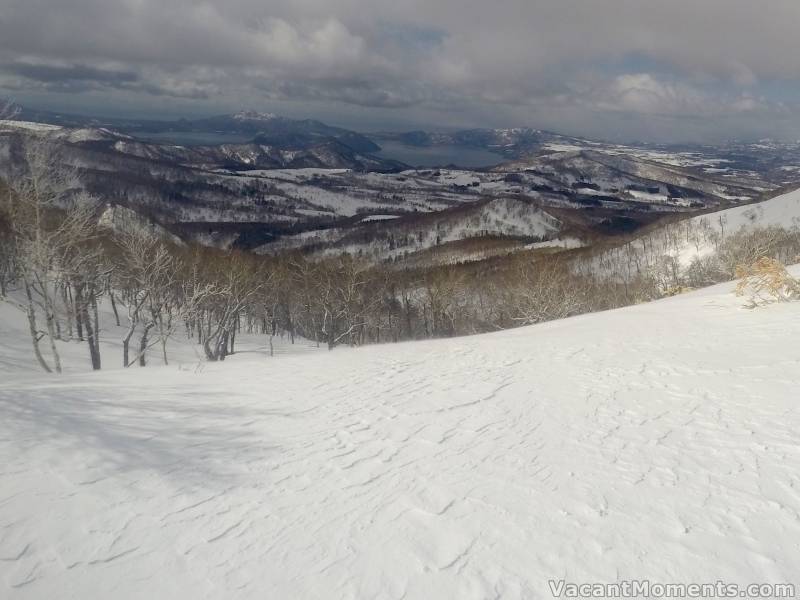 Wind affected snow looking out towards what I think is Lake Toya<BR>and beyond that Uchiura Bay in the Pacific Ocean