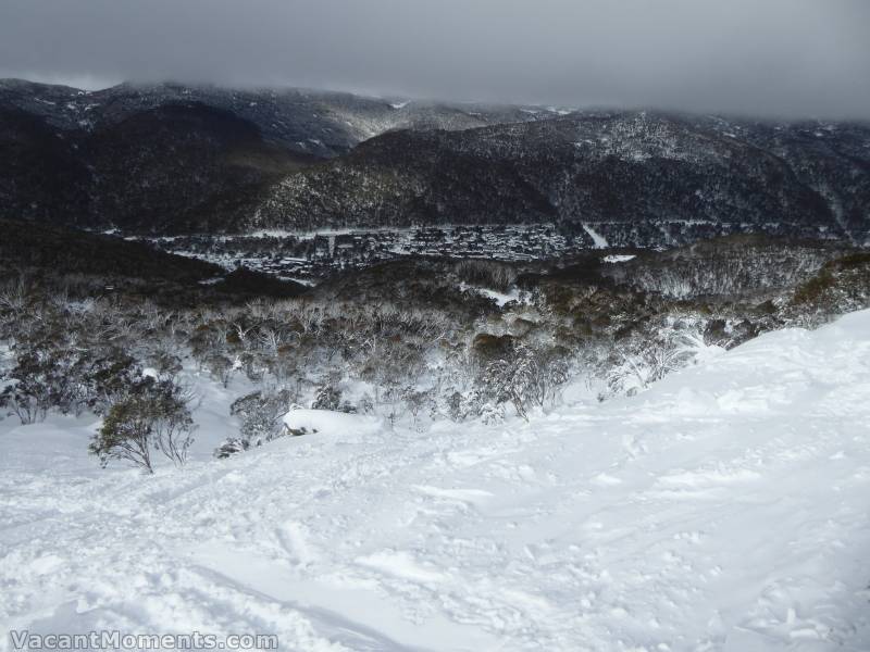 Looking down towards the village with trashed off piste below me