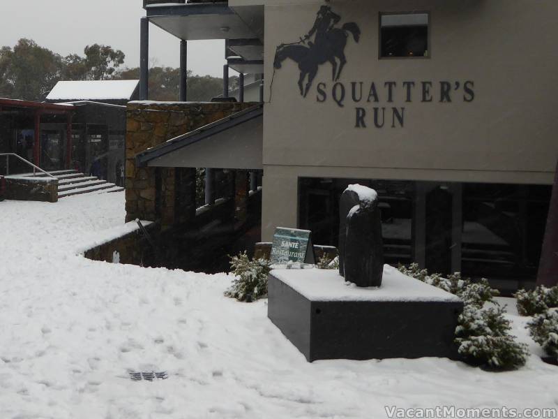 Village Square yesterday afternoon as the snow was settling