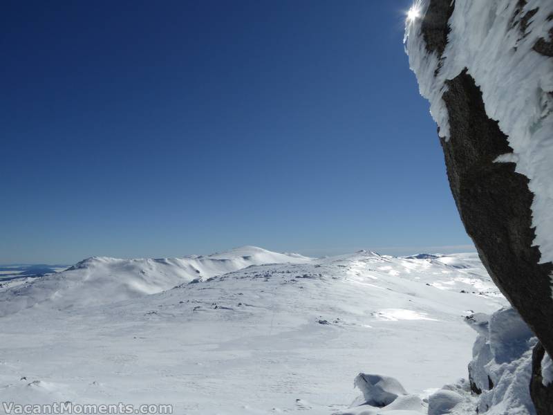 From the top of Pyramid looking at Mt Kosciuszko (far centre), the cornice to the left and the South Ridge