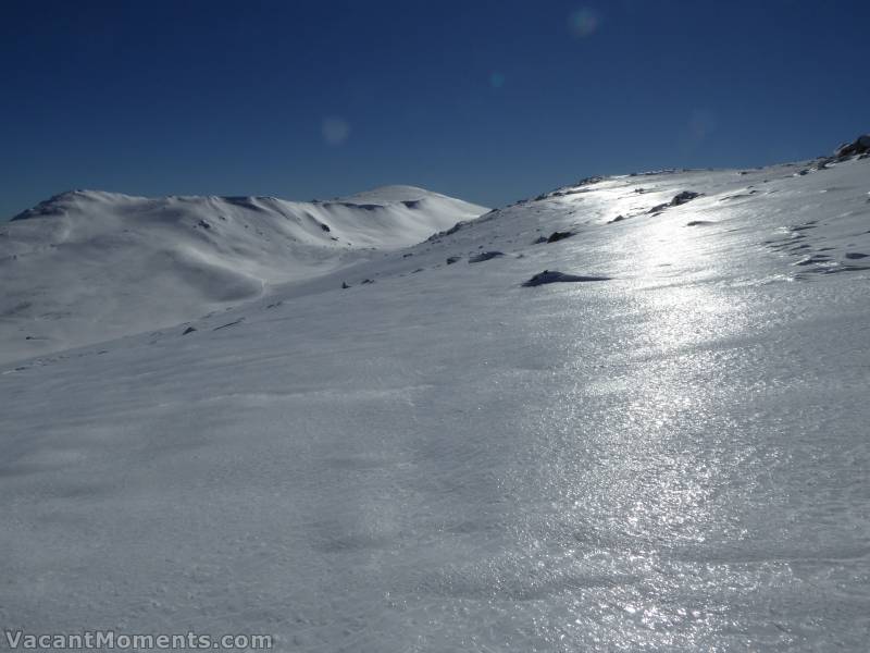 All west facing slopes were covered in frozen bubble wrap and<BR>consequently I did not descend far into Cootapatamba Valley