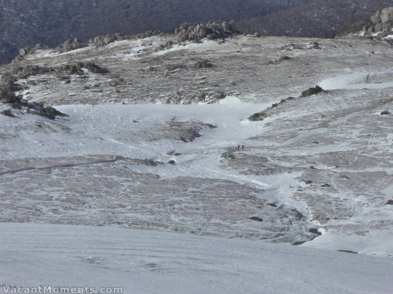 View back down to the bridge, showing how thin the snow cover really is