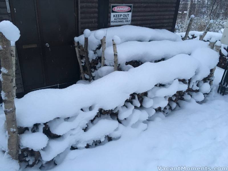 Peter's photo of the snowfall that smothered his wood store before he got it inside