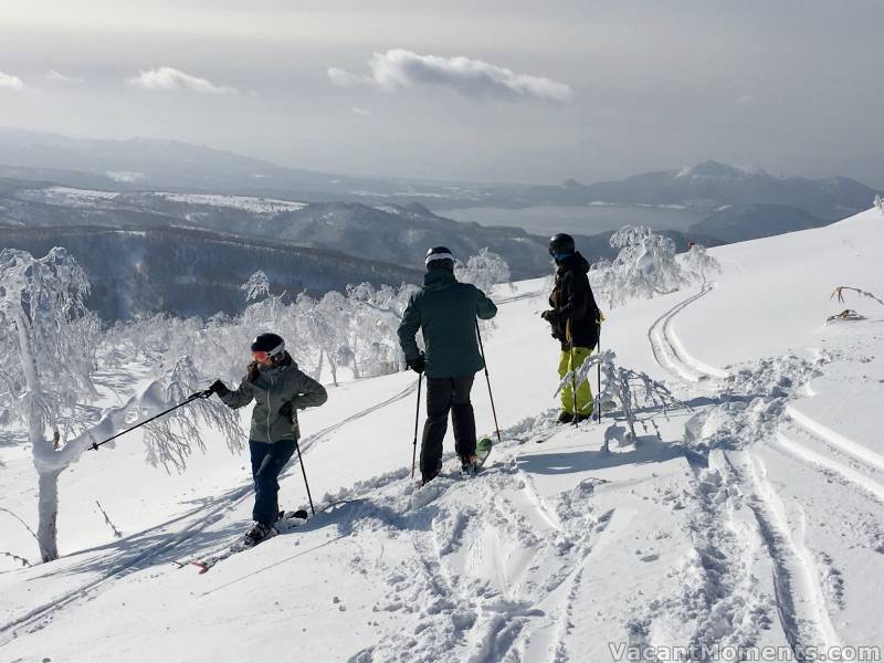 Lucky Phil (centre) discussing where next to go for untracked pow