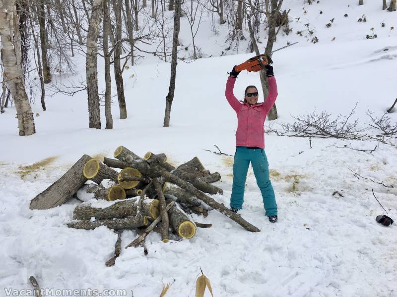 Preparing for the next winter - Andrea with chainsaw