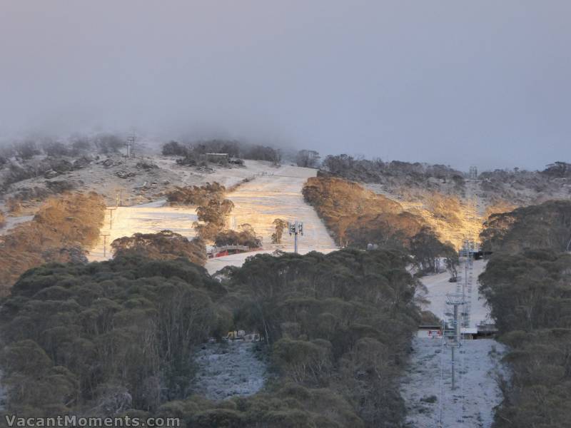 The first rays break through whilst Eagles Nest is veiled in cloud